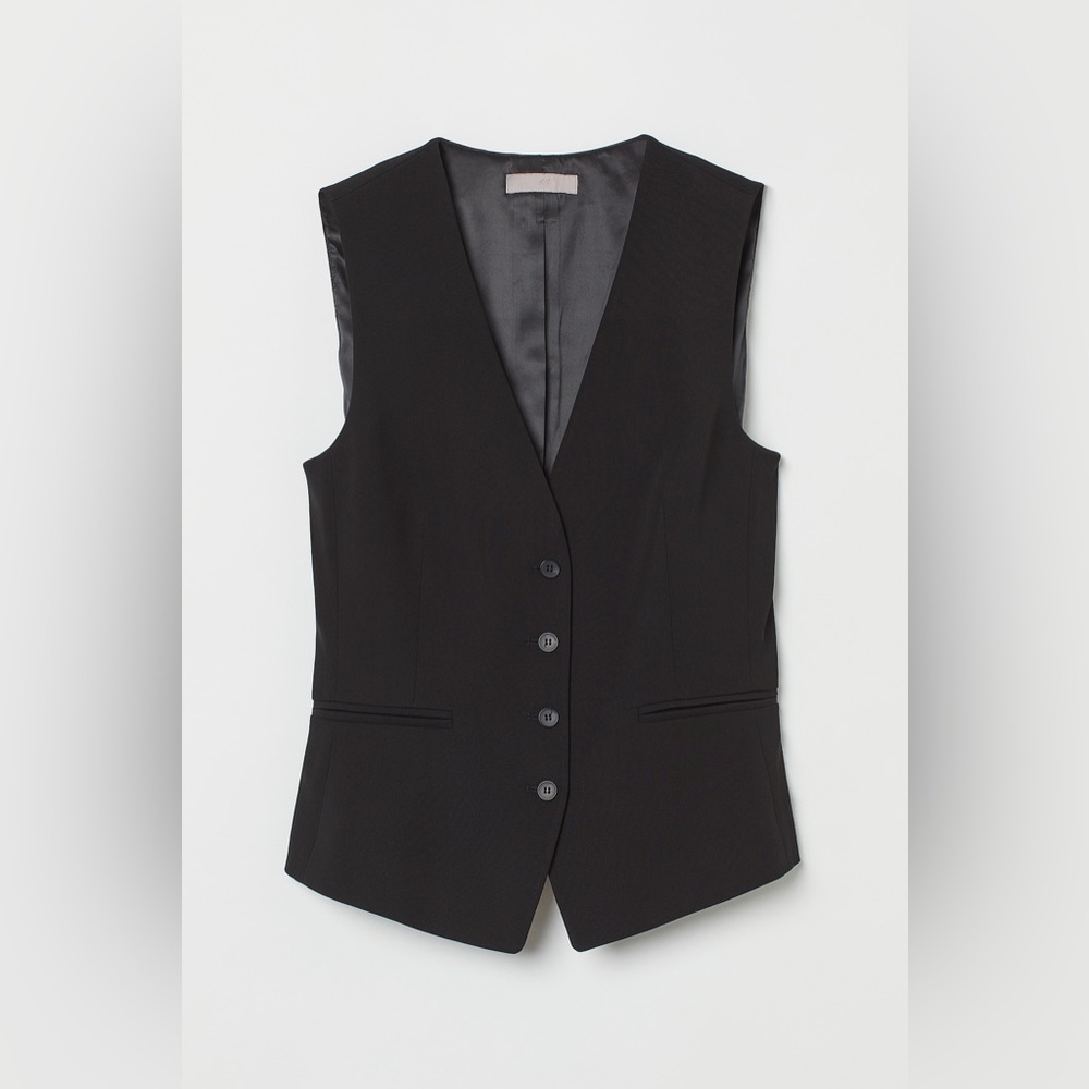 Brand new tags on blazer vest